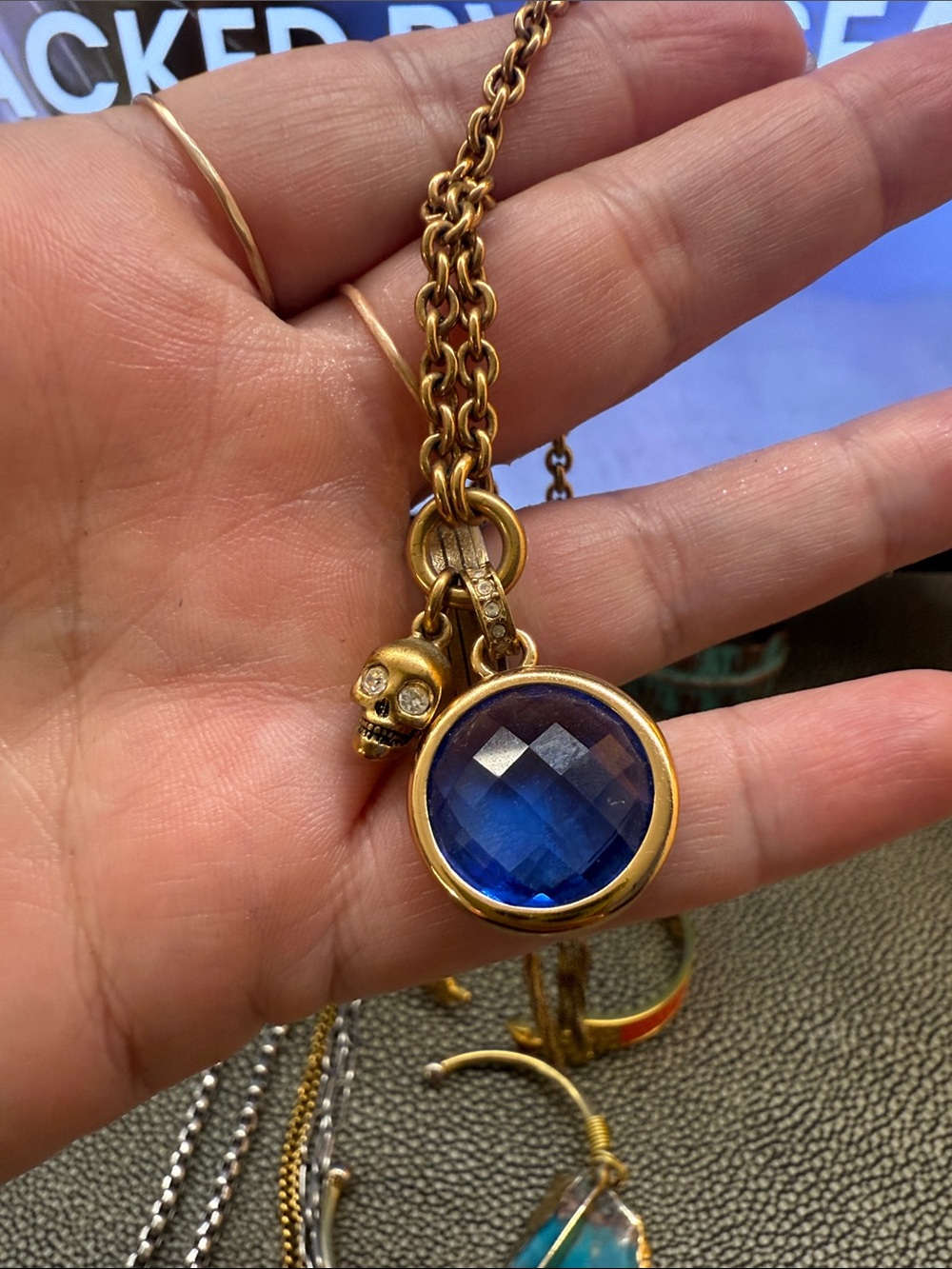 Juicy Couture Necklace with Skull and Blue Stone